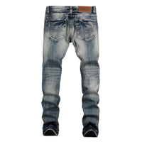 Men’s slim fit ripped biker jeans with distressed details and stretch denim, ideal for streetwear and casual fashion.








