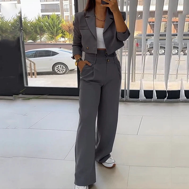Women's fashion two-piece suit, stylish top and casual pants set, breathable and comfortable outfit for everyday wear.








