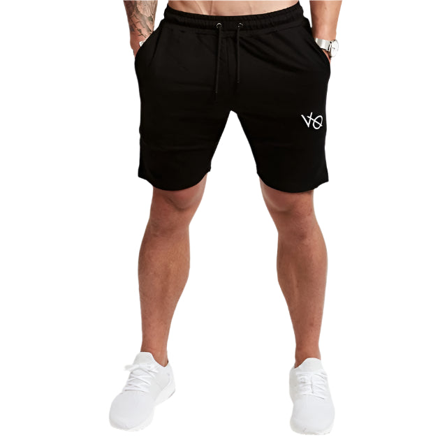 "Men's workout running shorts made from lightweight, moisture-wicking fabric for comfort and breath ability. The shorts feature an elastic waistband with an adjustable drawstring, side pockets, and a relaxed fit, perfect for running or intense workout sessions."