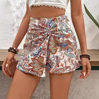 Vacation Printed Front Knot Shorts High Waist Fake Two-piece Skirt – A stylish, high-waisted skirt with a faux two-piece design and trendy front knot detail, perfect for vacation or casual outings.








