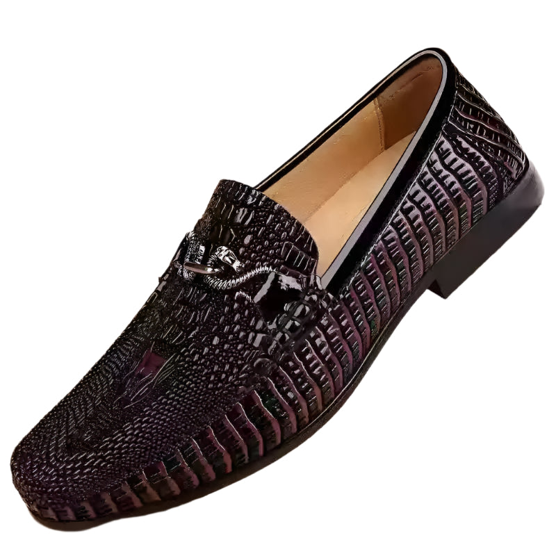 Men’s slip-on driving shoes in snake-pattern embossed leather with flat sole design.

