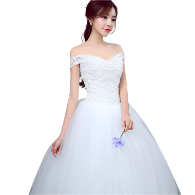 Simple and slim white wedding dress with a sleek design, perfect for brides who prefer minimalist elegance.

