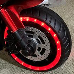 TAMCO 12V kids motorcycle ride-on toy with training wheels, designed for a fun and safe riding experience. Features realistic details, adjustable speed, and easy-to-use controls, making it perfect for young riders to enjoy outdoor adventures while learning balance and coordination.







