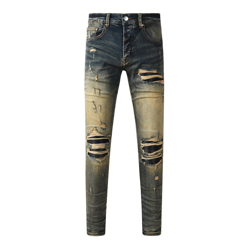 Men's distressed dark-wash jeans with subtle worn detailing and cotton denim