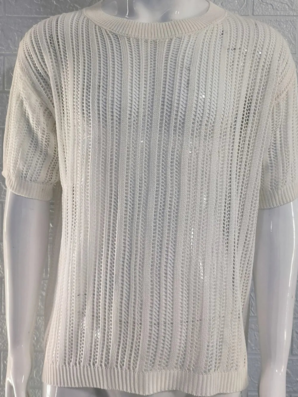 Men's openwork knit t-shirt with round neckline, front view

