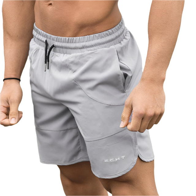 Men’s summer running shorts made from lightweight, breathable fabric, featuring an elastic waistband and moisture-wicking technology for comfort during workouts