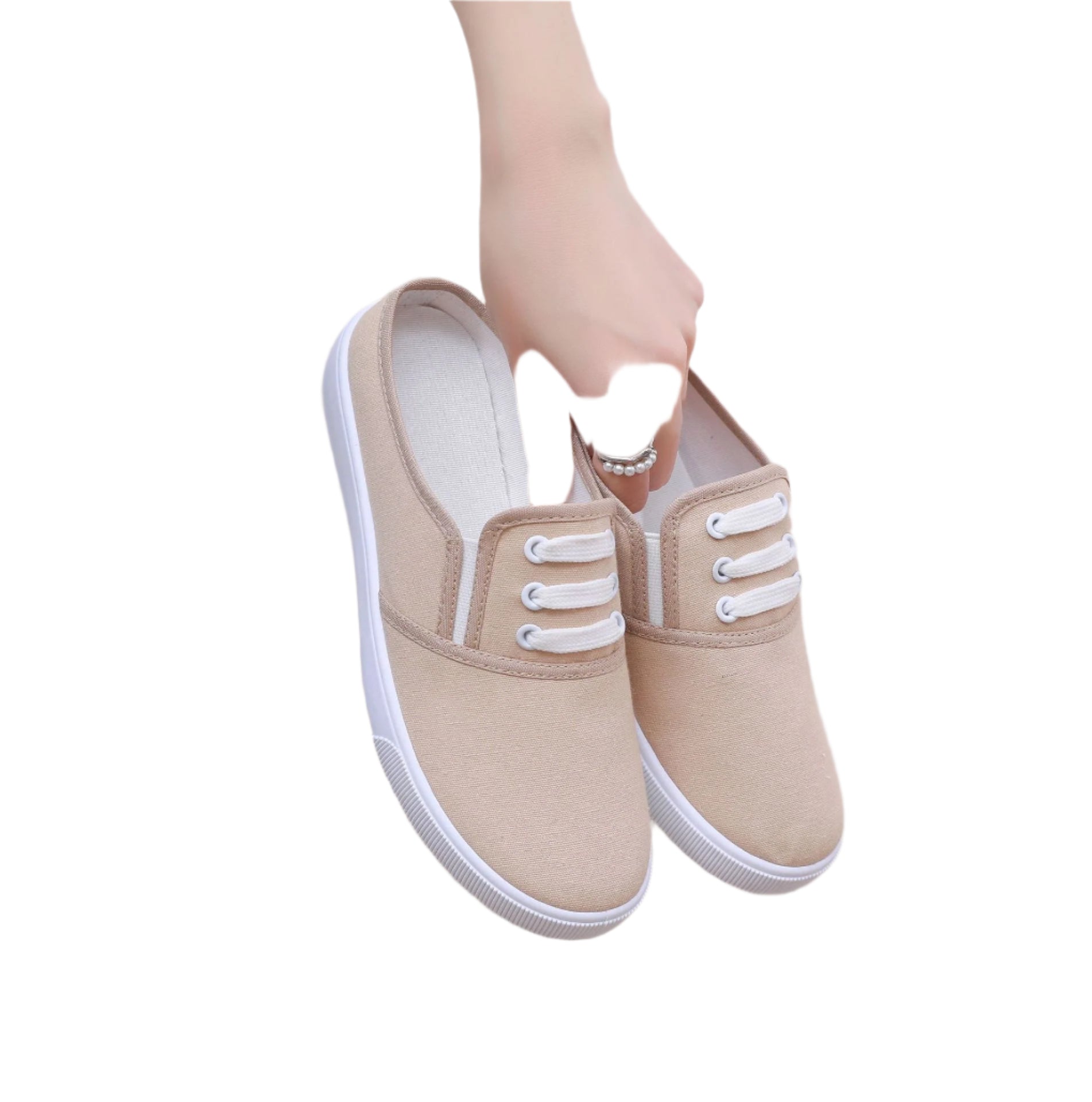 Comfortable slip-on canvas shoes for women with a flat sole, breathable upper, and versatile style, perfect for casual outings.








