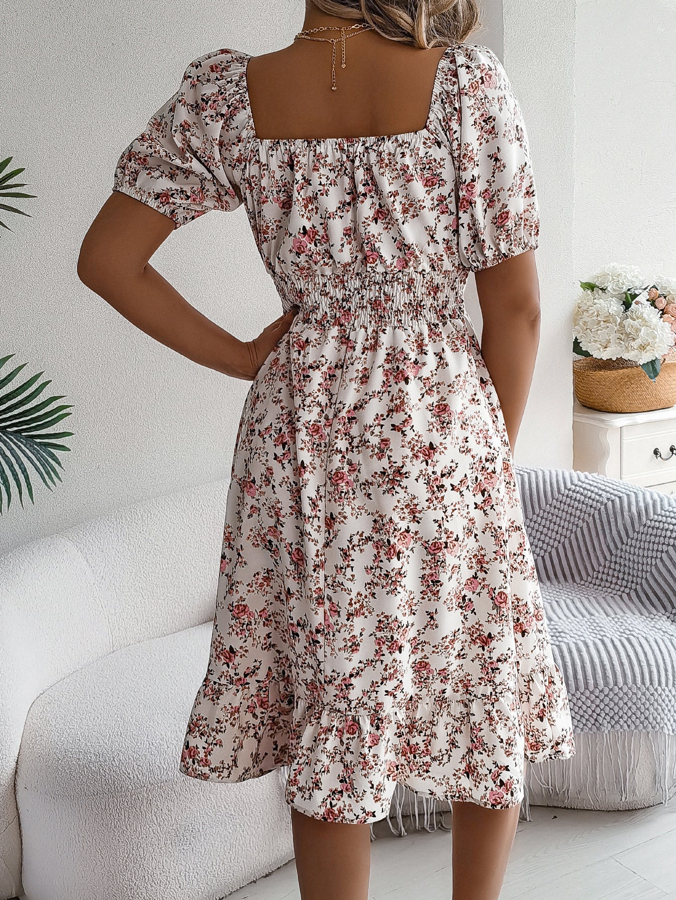 Women's floral print square collar dress with ruffle details, perfect for summer fashion and casual outings.

