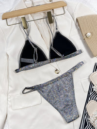 "Ocean Glow bikini featuring a stylish two-piece design with a shimmering ocean-inspired pattern and adjustable straps for a secure, comfortable fit. Made from soft, stretchy fabric, perfect for beach outings, poolside relaxation, and summer fun