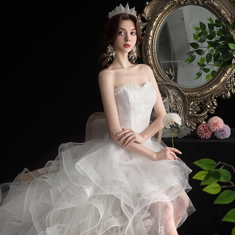 Bridal gown featuring a short front and long back desi“Fairytale Wedding Dress – enchanting bridal gown with magical details, perfect for a storybook wedding – Hot Deal Warehouse bridal”


