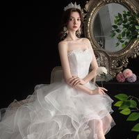 Bridal gown featuring a short front and long back desi“Fairytale Wedding Dress – enchanting bridal gown with magical details, perfect for a storybook wedding – Hot Deal Warehouse bridal”


