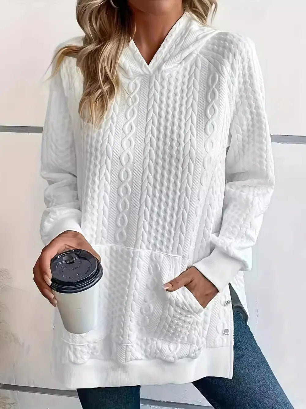 Women's oversized solid color hoodie with long sleeves, front view

