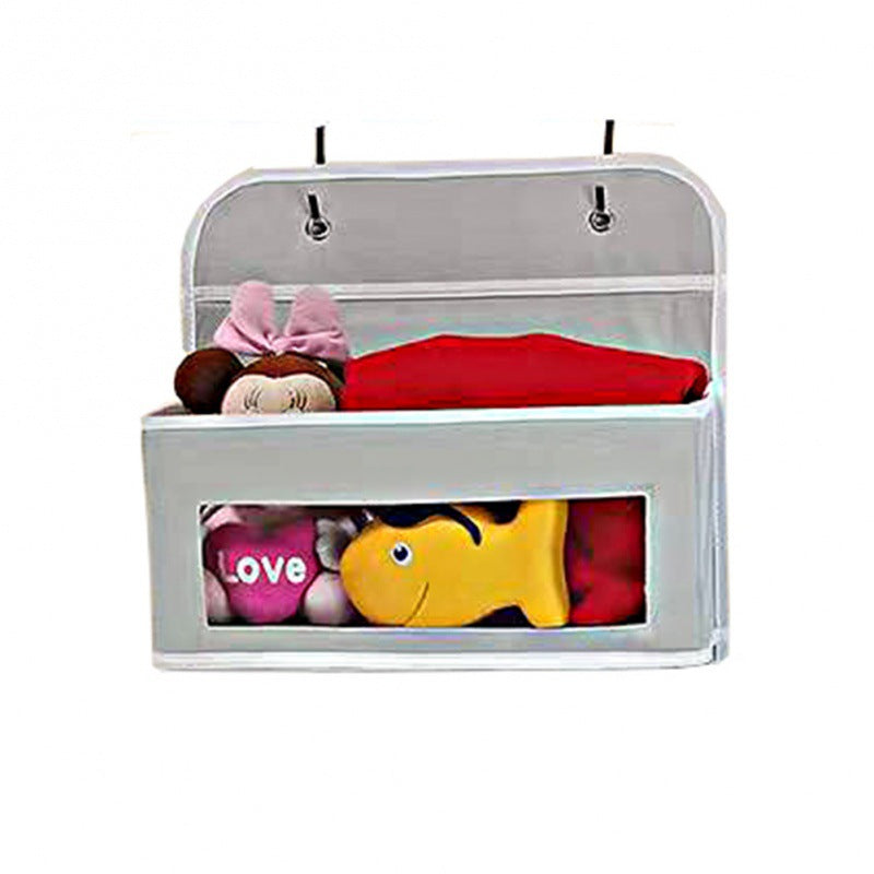 5-pocket hanging organizer on the back of a white bedroom door

