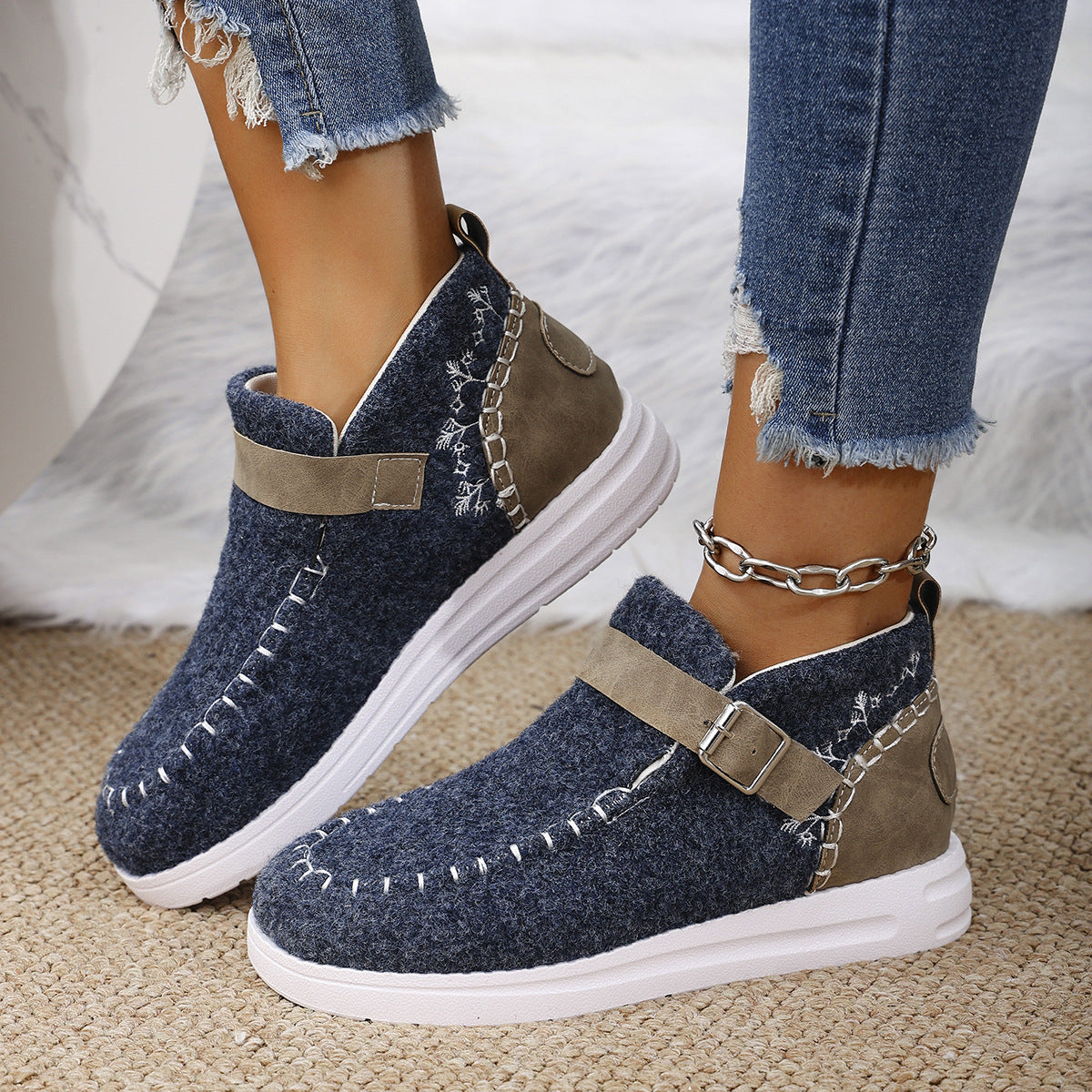 Warm flat bottom cotton shoes with burr closure for comfort and insulation during colder weather.








