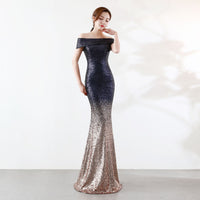 Elegant slimming long dress for birthday parties and event hosting, featuring a figure-hugging design and a graceful silhouette.


