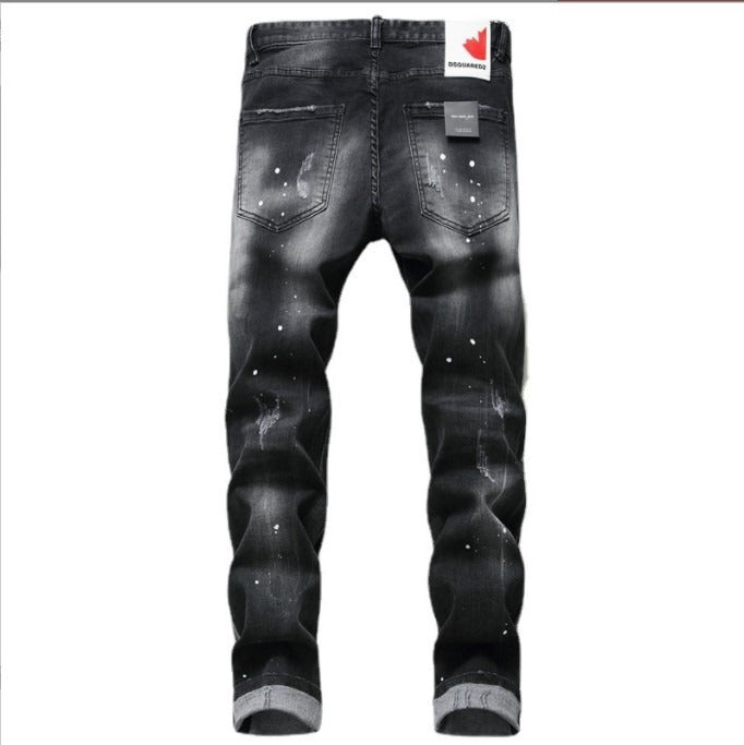 Men’s black and gray distressed jeans with torn holes and zipper decoration.

