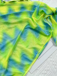 Island Crush bikini featuring a vibrant, tropical print with a flattering two-piece design. Includes adjustable straps for a custom fit and made from soft, stretchy fabric, perfect for a fun day at the beach or poolside lounging.