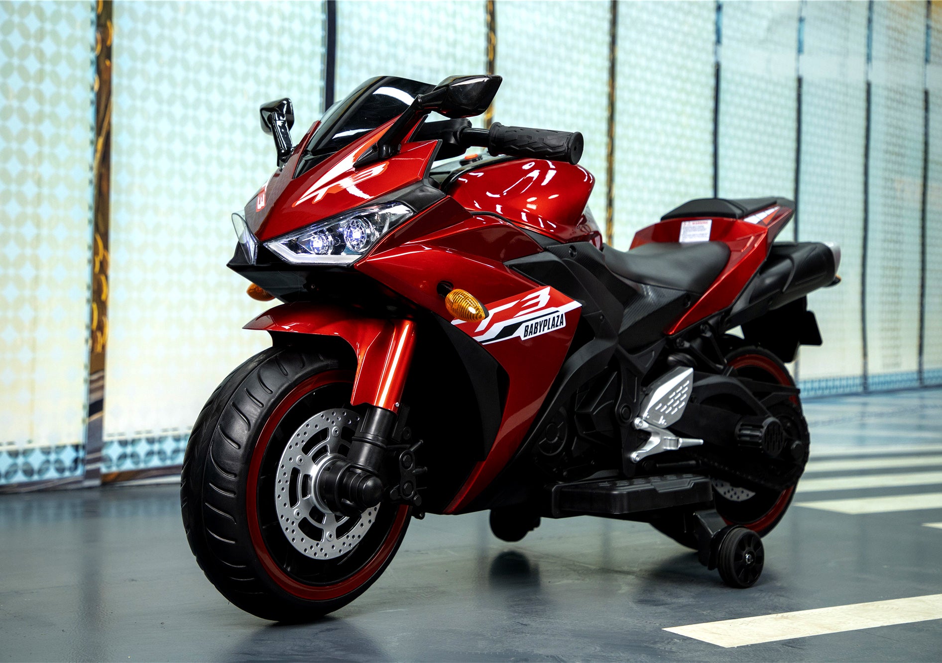 TAMCO 12V kids motorcycle ride-on toy with training wheels, designed for a fun and safe riding experience. Features realistic details, adjustable speed, and easy-to-use controls, making it perfect for young riders to enjoy outdoor adventures while learning balance and coordination.







