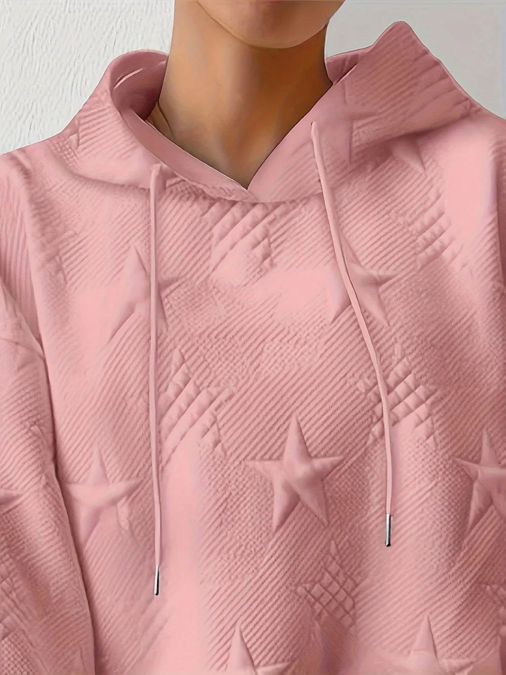 White women’s casual pullover hoodie with star texture and drawstring hood.








