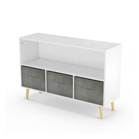 White kids bookcase with gray fabric drawers and books displayed