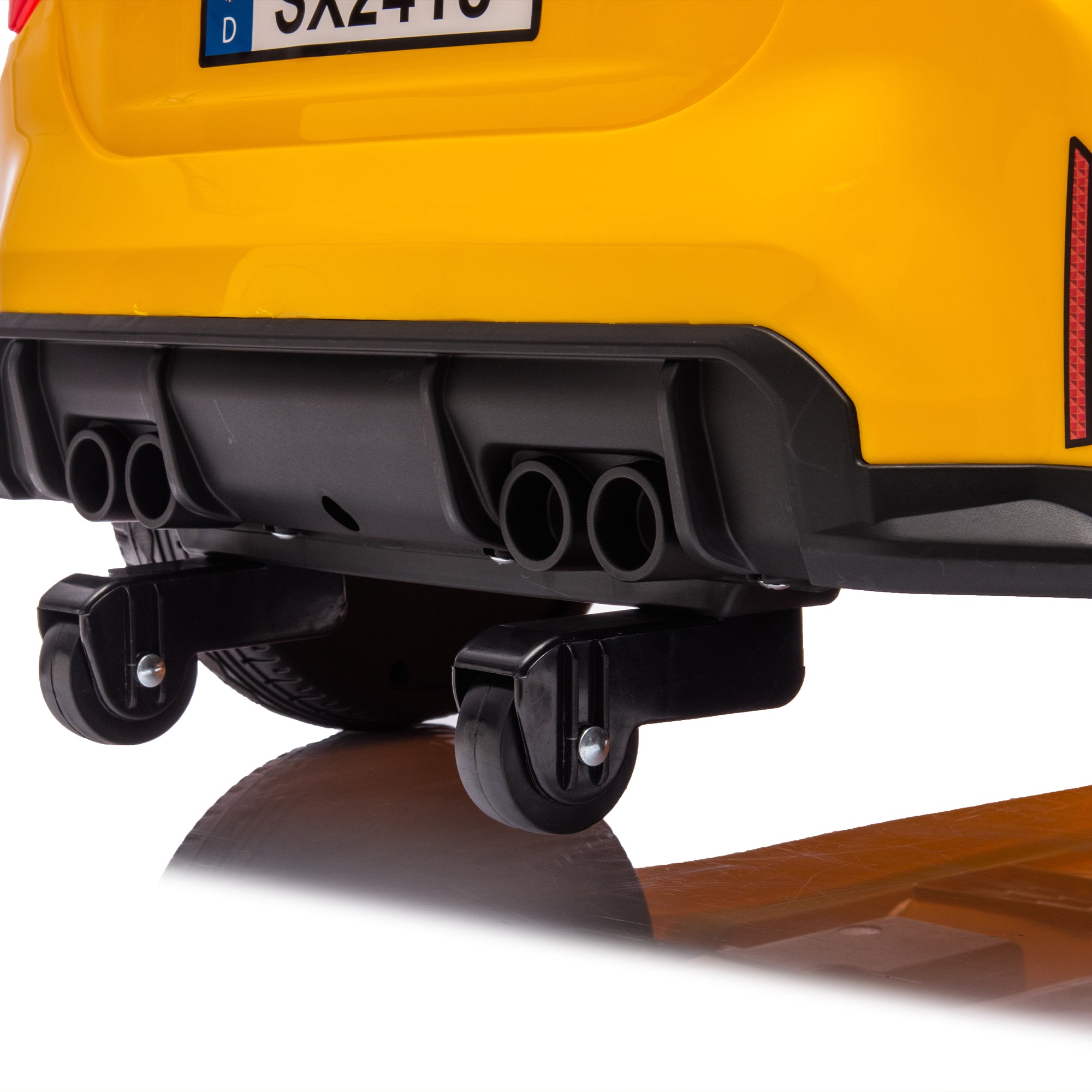 Yellow BMW M4 12V electric ride-on car for kids, featuring authentic design with working headlights, MP3 player, and forward/reverse motion. Comes with adjustable seat and steering wheel, providing a realistic driving experience for children aged 3-6