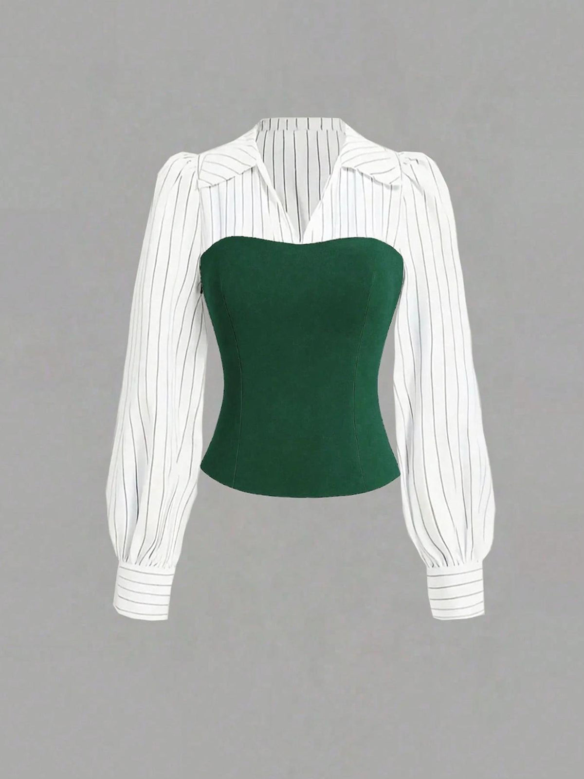 Green strapless top with a white pinstripe blouse on a gray background