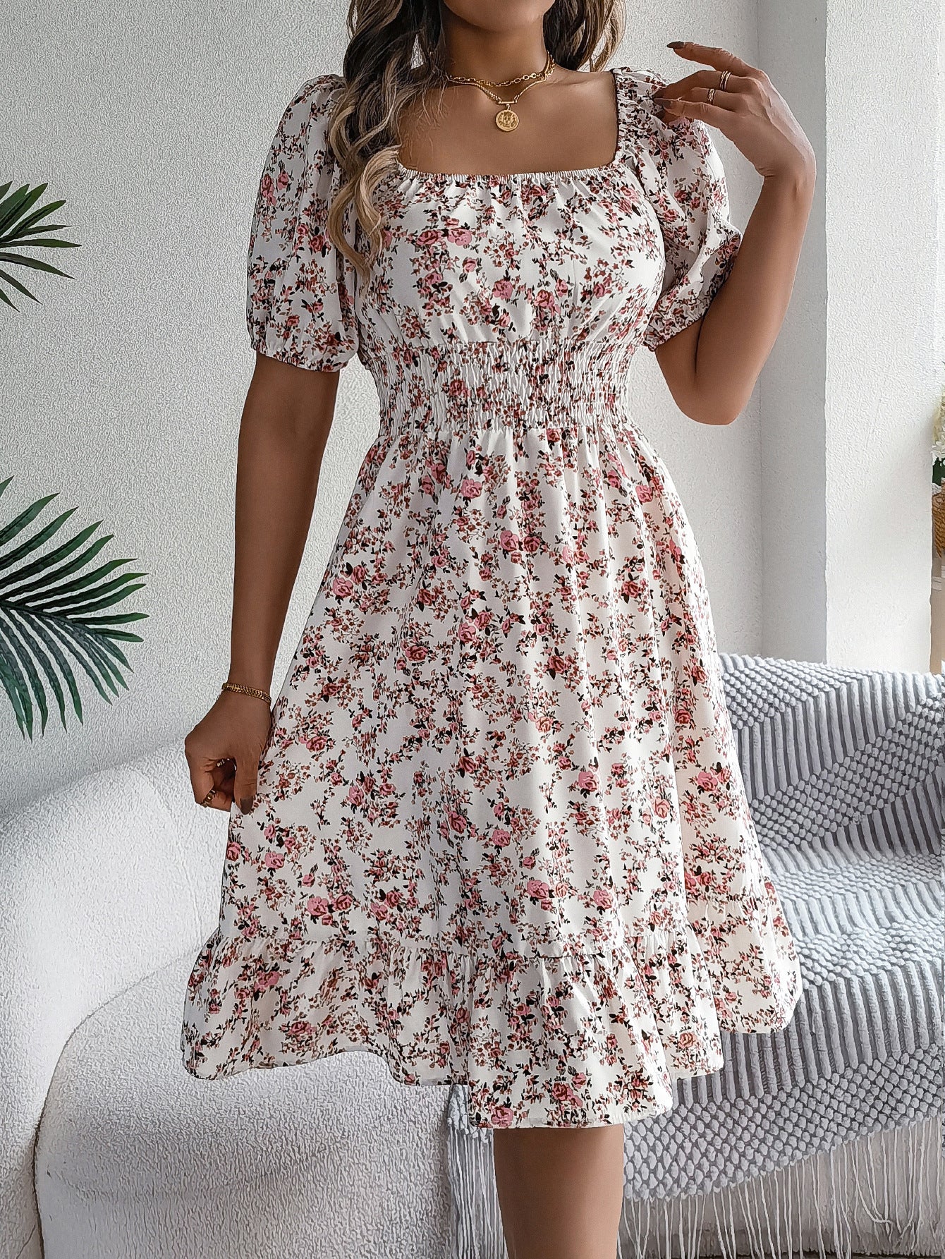 Women's floral print square collar dress with ruffle details, perfect for summer fashion and casual outings.

