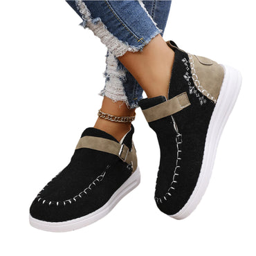 Warm flat bottom cotton shoes with burr closure for comfort and insulation during colder weather.








