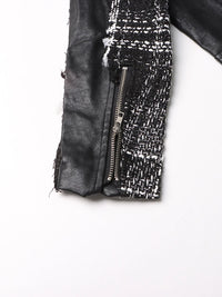 Colorblock women's coat with leather and tweed patchwork, lapel collar, long sleeves, and front zipper.

