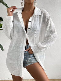 Women’s drop shoulder button front kimono long sleeve top with relaxed fit and button detailing.

