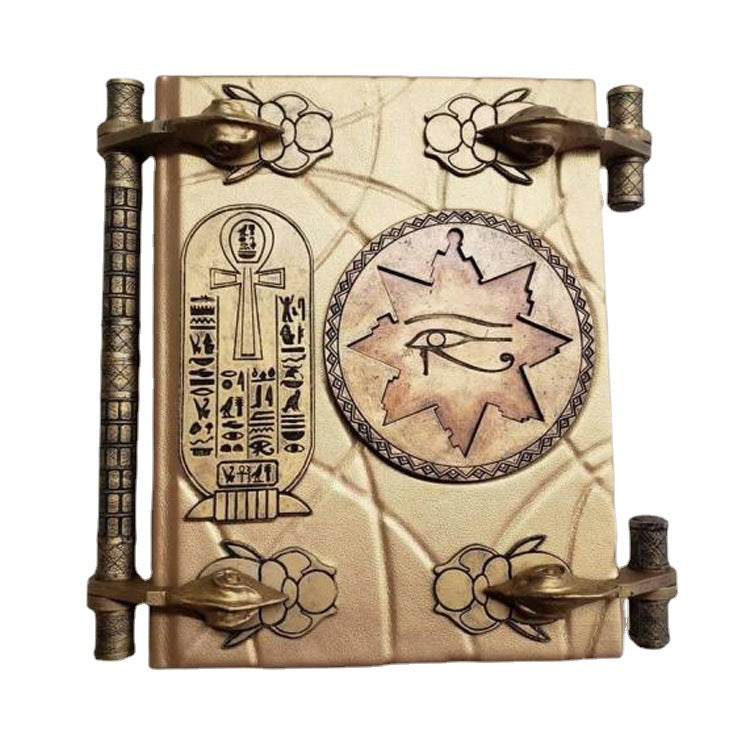 Close-up of the Book of the Dead mummy prop showing resin texture and engravings
