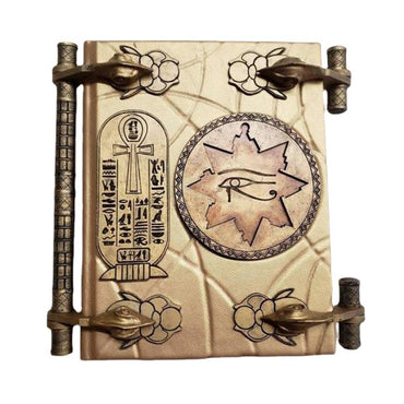 Close-up of the Book of the Dead mummy prop showing resin texture and engravings