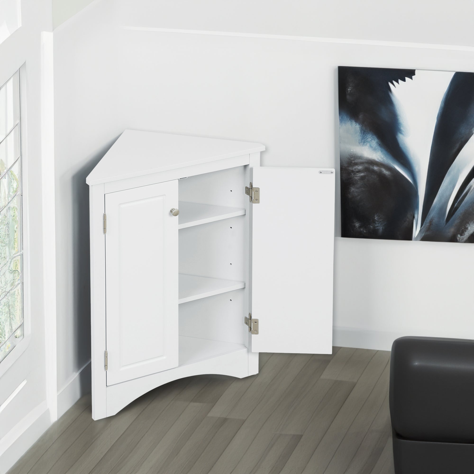 White triangle bathroom storage cabinet with a compact, space-saving design, featuring multiple shelves for organizing toiletries, towels, and other bathroom essentials. Made from durable materials, this sleek cabinet adds a functional and stylish touch to any bathroom decor.