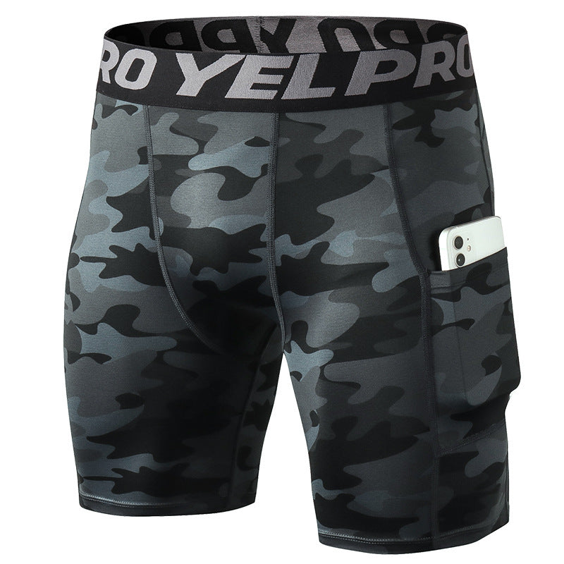 Men’s black PRO gym shorts with built-in compression tights, side pockets, and sweat-wicking fabric

