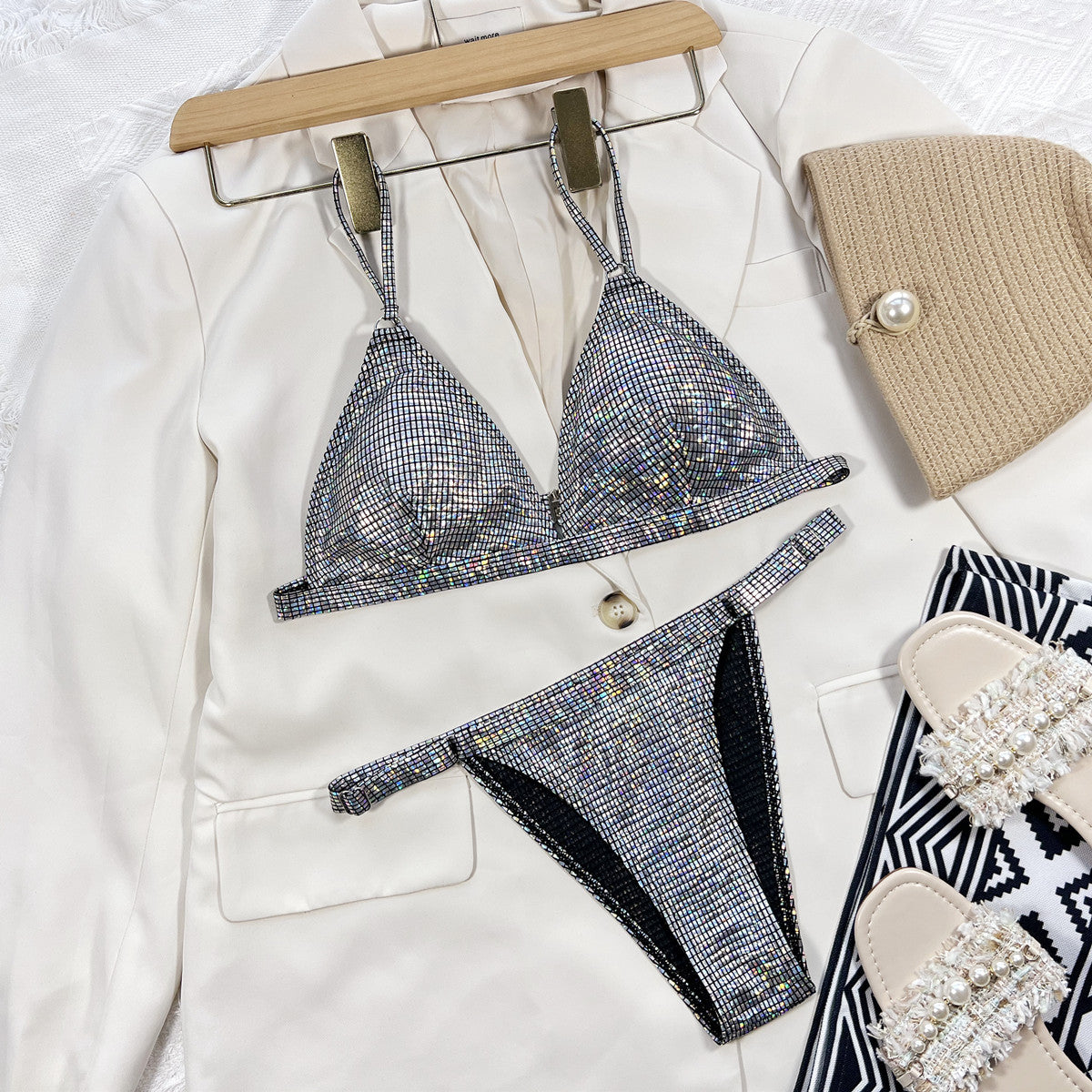 "Ocean Glow bikini featuring a stylish two-piece design with a shimmering ocean-inspired pattern and adjustable straps for a secure, comfortable fit. Made from soft, stretchy fabric, perfect for beach outings, poolside relaxation, and summer fun