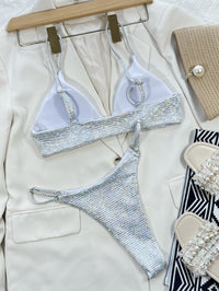  Sunlit Sands bikini featuring a bright and elegant design with a flattering fit. Made from high-quality, stretchy fabric for comfort and style, perfect for beach days, poolside relaxation, and enjoying sunny vacations.