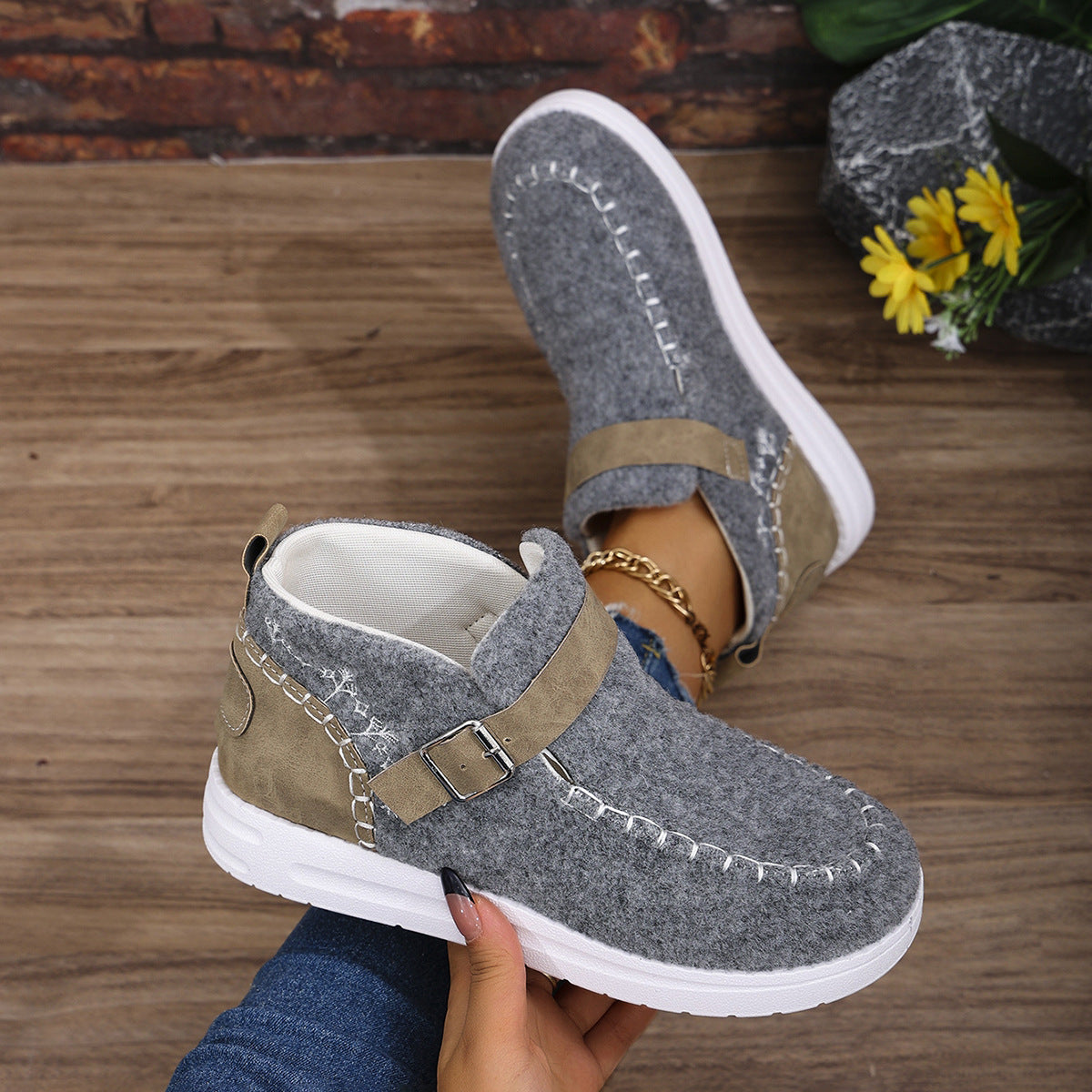 Warm flat bottom cotton shoes with burr closure for comfort and insulation during colder weather.








