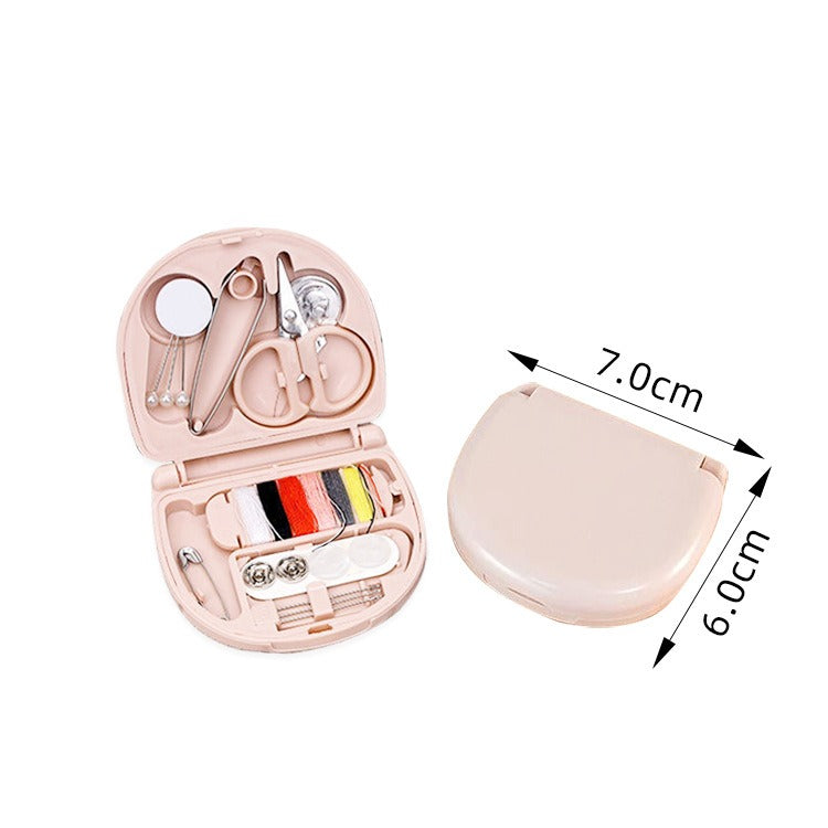 Compact mini needle box designed for organizing sewing needles, featuring multiple compartments for easy access and storage, perfect for home or travel use