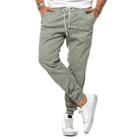Loose tapered fit casual pants for men, perfect for spring and autumn, with multiple pockets and a stylish, comfortable design for outdoor or leisure wear.