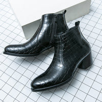 Men’s British-style leather fashion boots with lace-up design and rubber sole.

