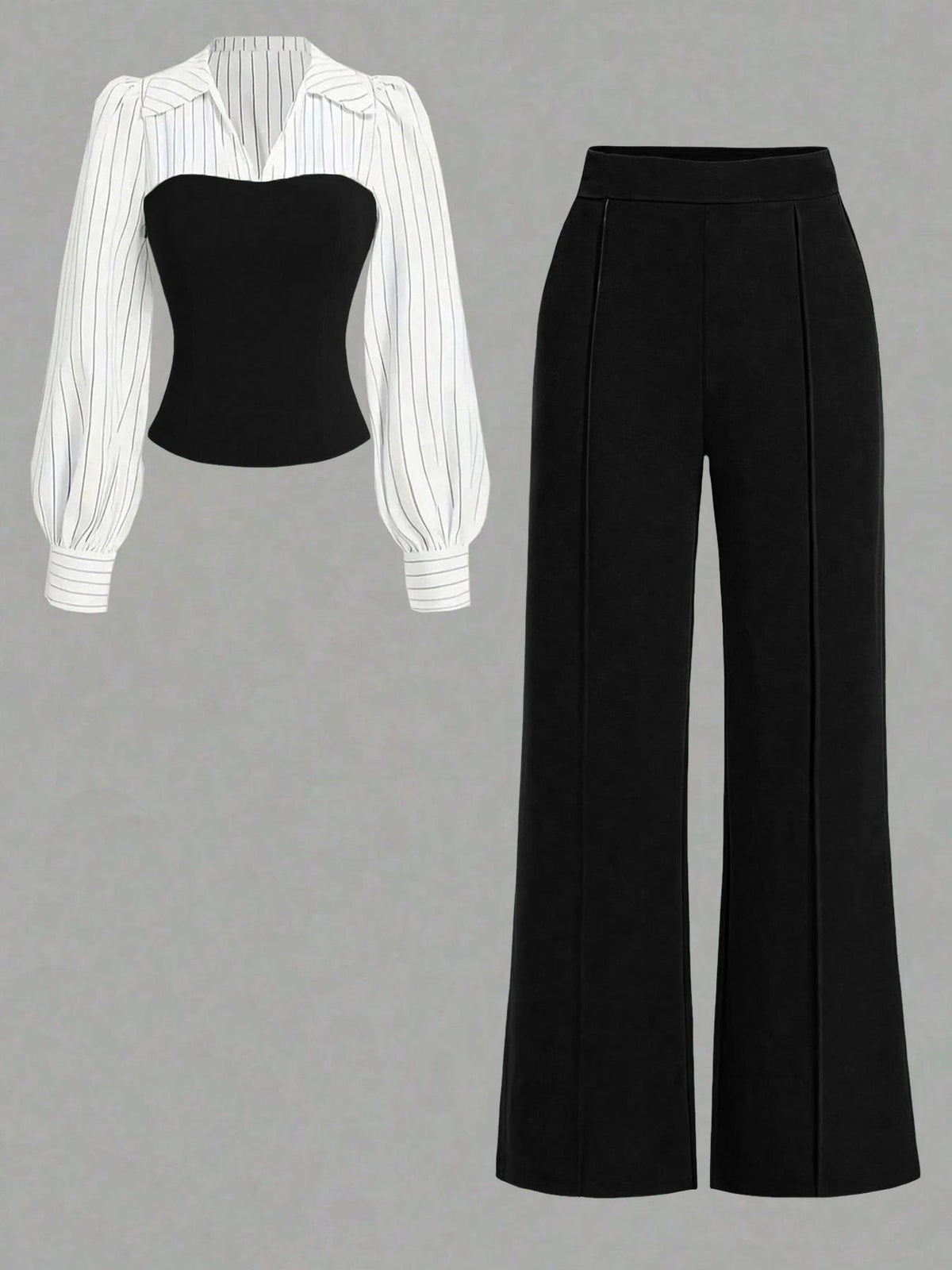 Black strapless top and black wide-leg pants with a white striped shirt on a gray background