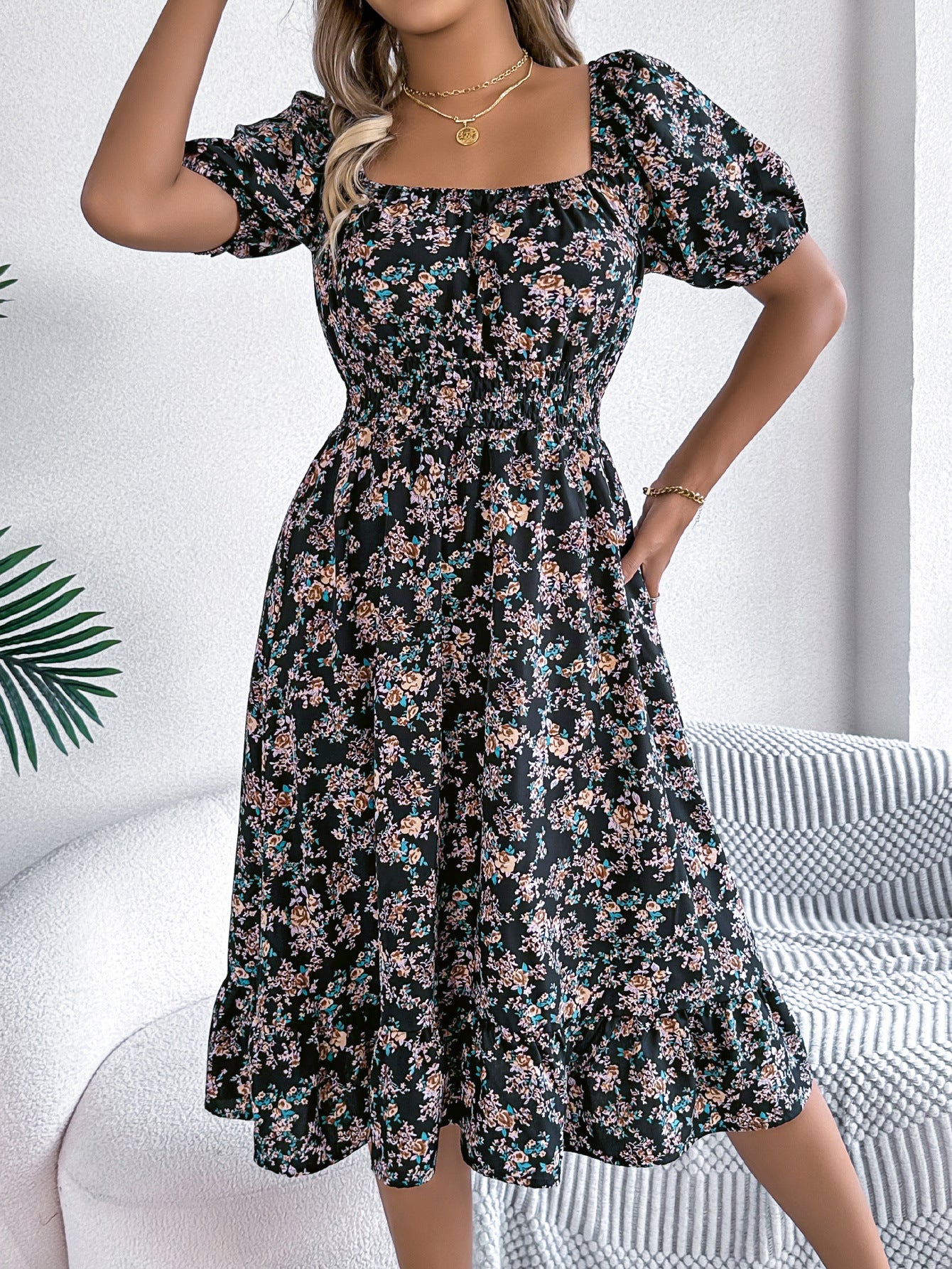 Women's floral print square collar dress with ruffle details, perfect for summer fashion and casual outings.


