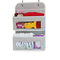 5-pocket hanging organizer on the back of a white bedroom door

