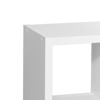 White 8-cube organizer shelf used in a modern home office