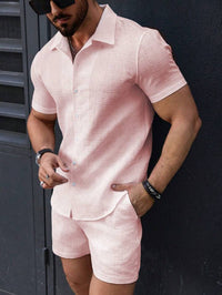 Leisure Breathable Beach Two-Piece Set – Vintage textured solid shirt and shorts, offering a comfortable and breathable summer look for men.








