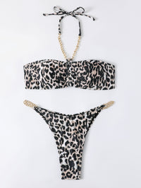 Sunkissed Bliss bikini featuring a chic and vibrant design with a flattering cut. Made from high-quality, stretchy fabric for a comfortable fit, perfect for lounging by the pool, beach days, and sunny vacations.