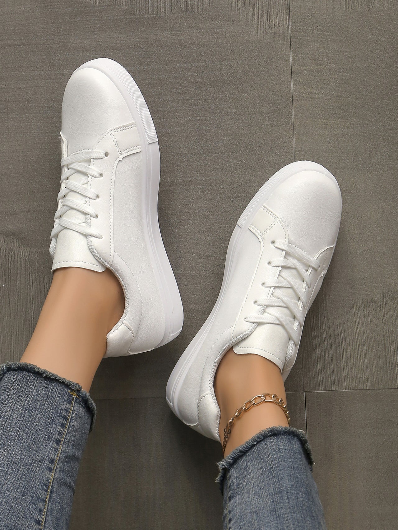 Lace-up White Shoes Women's Flat Leather Surface Sneakers for casual and stylish everyday wear.








