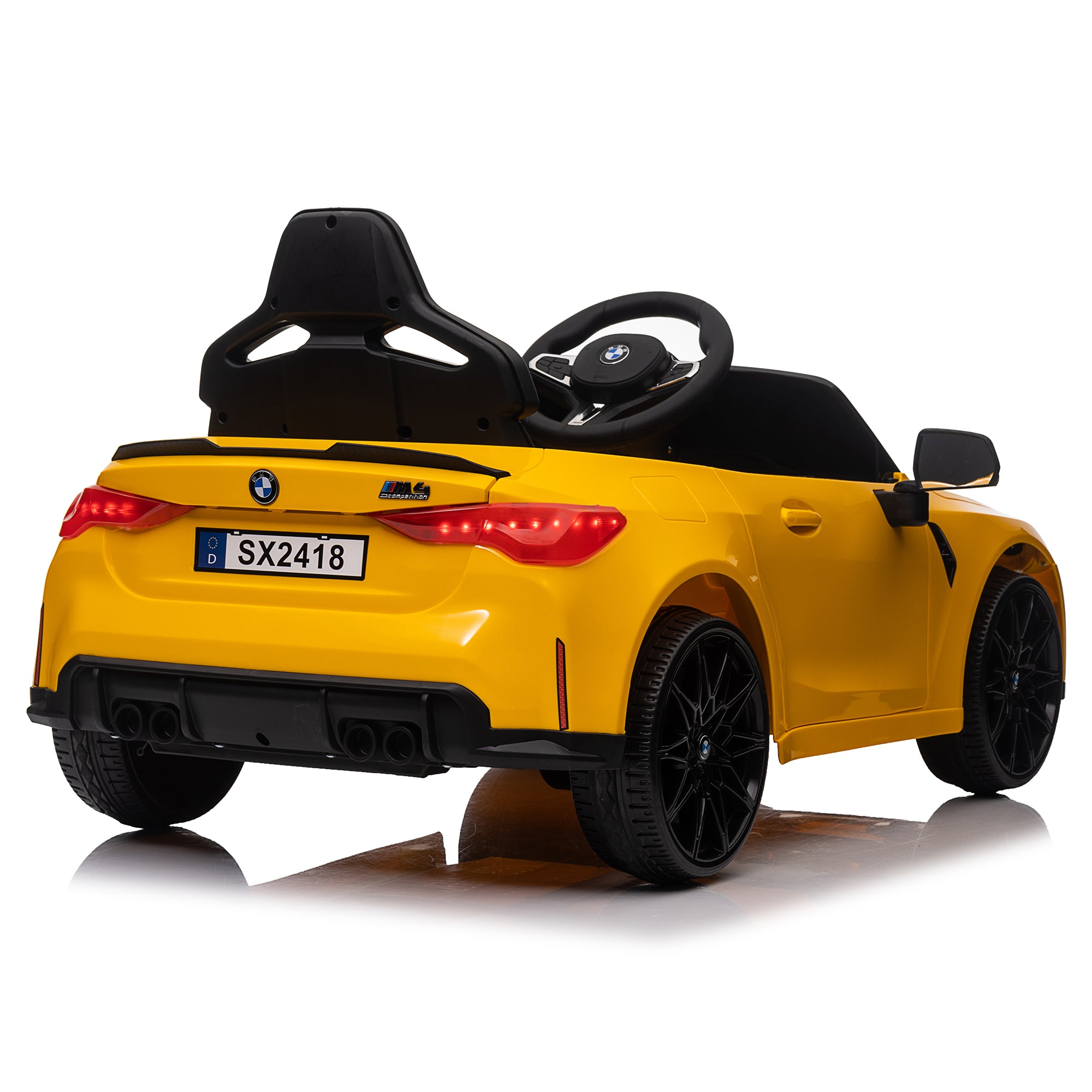 Yellow BMW M4 12V electric ride-on car for kids, featuring authentic design with working headlights, MP3 player, and forward/reverse motion. Comes with adjustable seat and steering wheel, providing a realistic driving experience for children aged 3-6