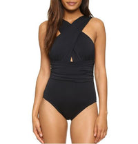 Tequila Shots cross halter swimsuit featuring a trendy and bold design with a flattering cross-back halter top. Made from high-quality, stretchy fabric for comfort and style, perfect for beach days, pool parties, and sunny vacations.