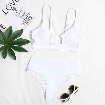 Surf Siren high-waist bikini featuring a retro-inspired design with a flattering high-waisted bottom for added comfort and support. Made from stretchy, durable fabric, perfect for beach days, poolside lounging, and stylish summer fun.